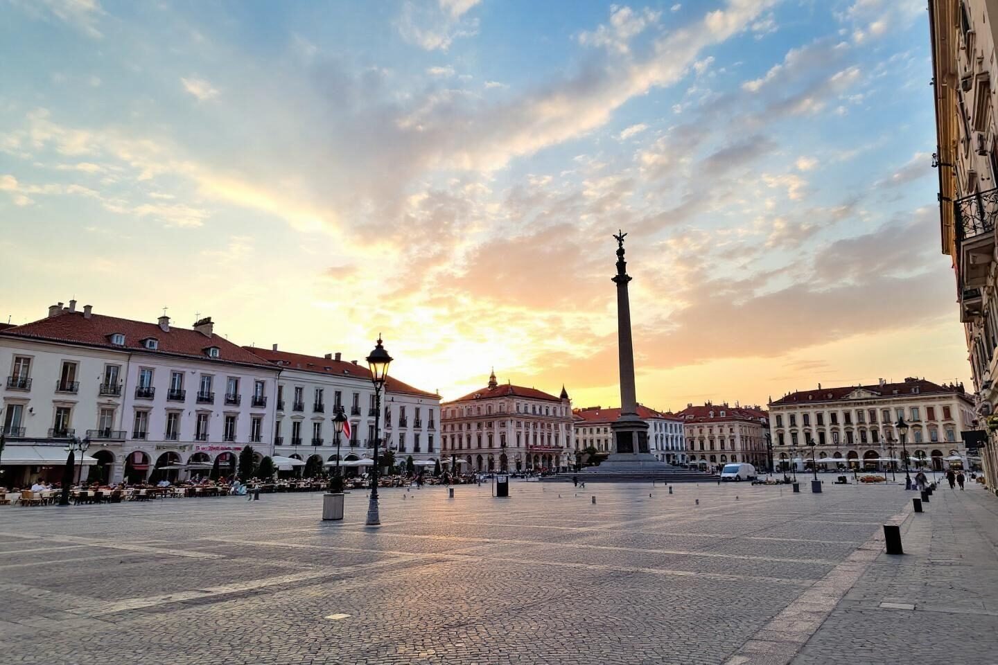 Elegant European square with column at golden hour