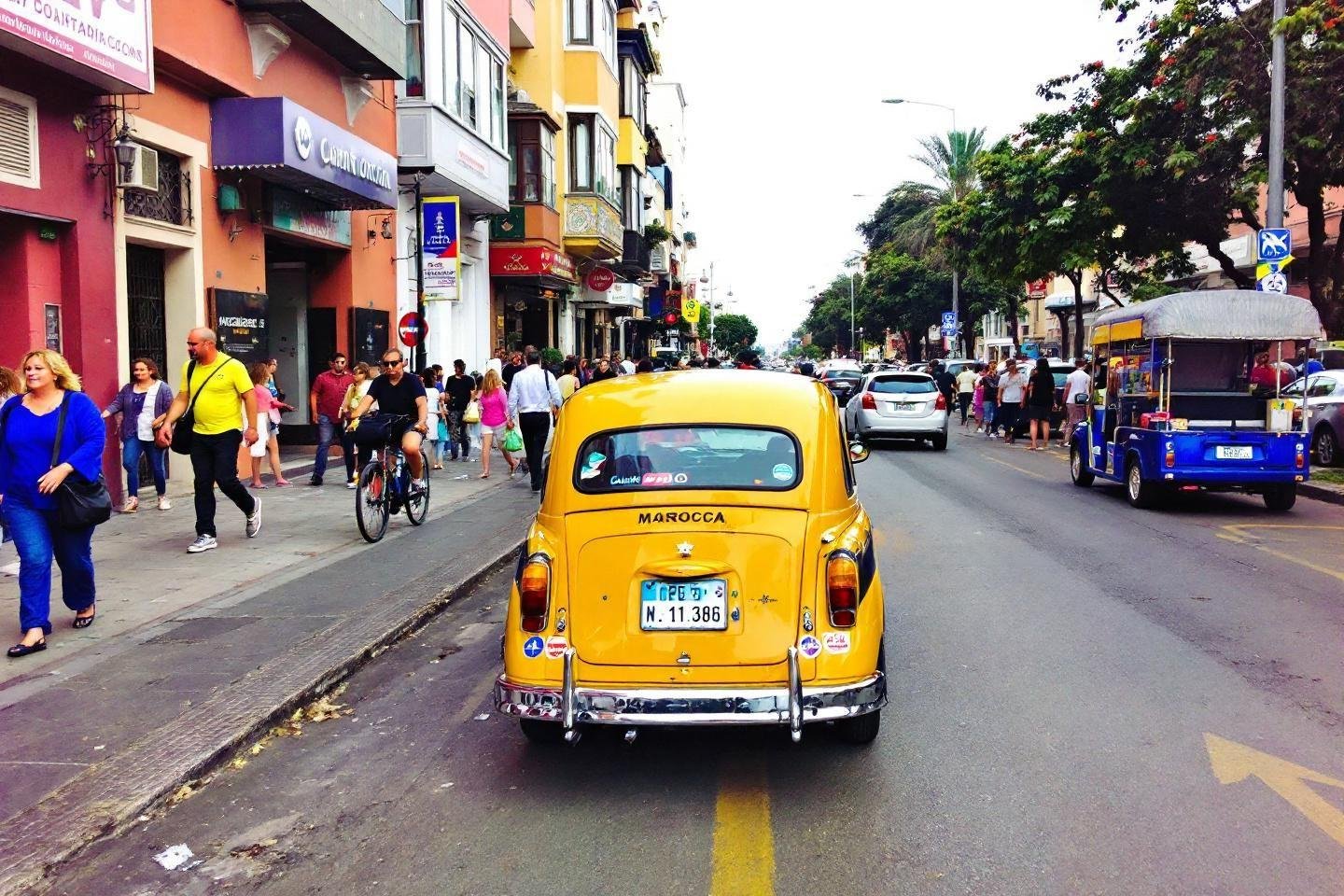 Complete guide to travel around Morocco with KiwiTaxi : airports, cities, and hotels Bright yellow classic car parked on busy urban street